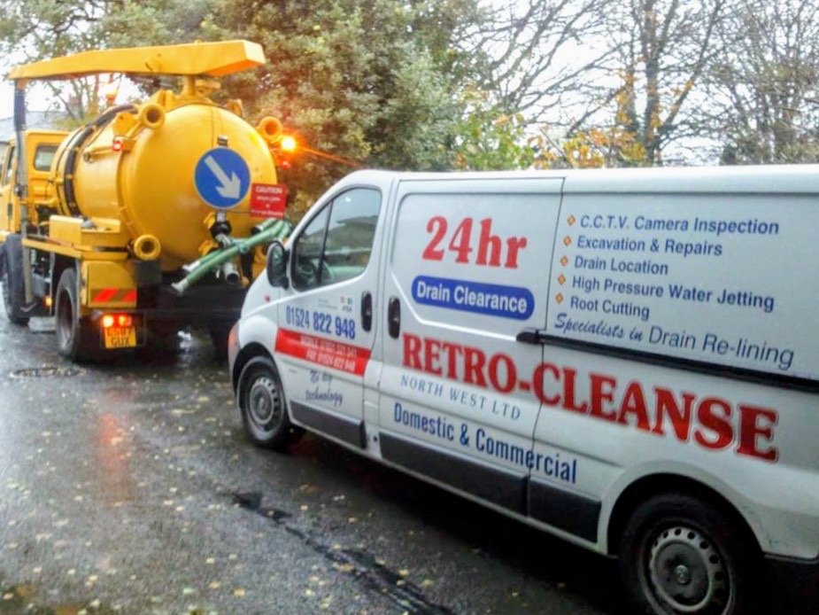Retro-Cleanse 24hr drain clearance van beside the tanker