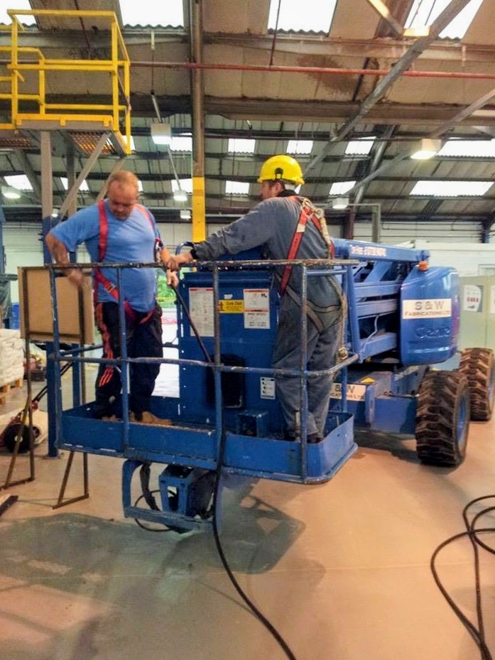 Retro-Cleanse team carrying out works from an access platform