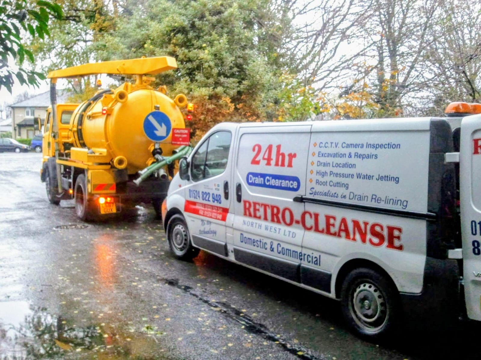 Retro-Cleanse drain clearance van and tanker on a wet road